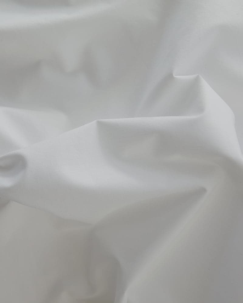 Primer plano del tejido de algodón del faldón de cama FamBed